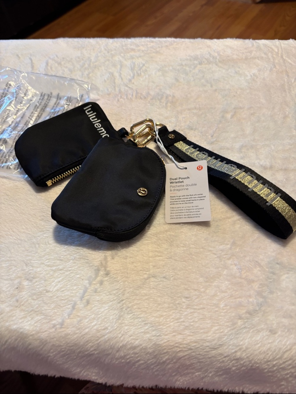 lululemon athletica Black Wrist Strap with Gold Logo Stripe